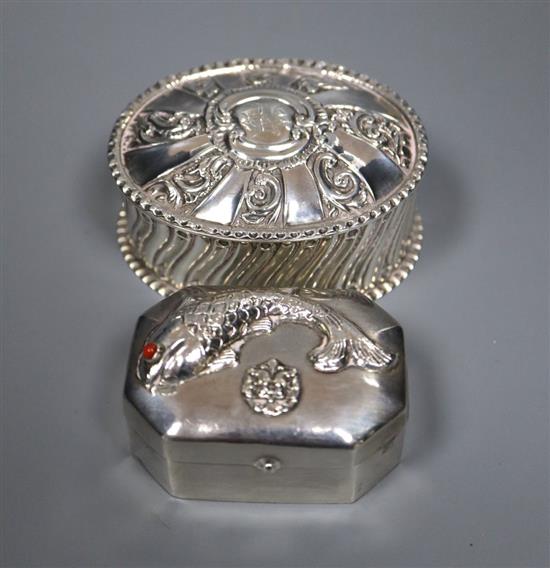 A late Victorian silver oval trinket box and a Middle Eastern trinket box.